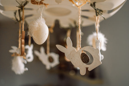Home interior with white easter decor, easter eggs on light background