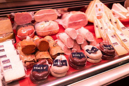 Valencia, Spain October 13: MAS Food Lovers Since 1945 food. Various types of sausage for sale Valencia Central Market or Mercat Central. Builted in 1914, one of the largest market in Europeのeditorial素材