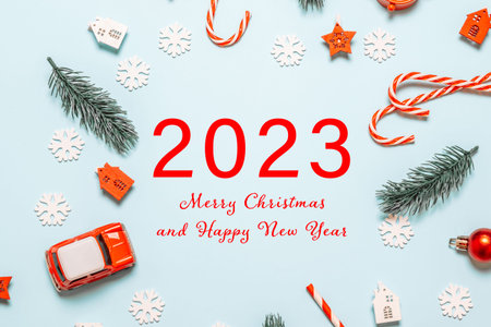 2023 Happy New Year and Merry Christmas. Christmas blue background design with garland, realistic...