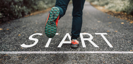 New year 2023 or start straight concept.Word start written on the asphalt. Start Concept. Low...