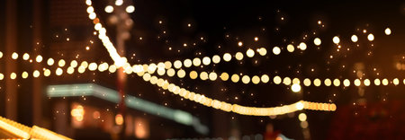 blurred background city street with Christmas illuminations, blurred holiday background. Christmas...