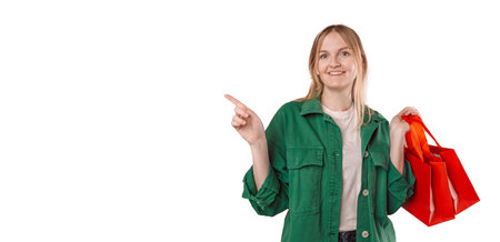 Photo of pretty shocked lady with shopping bags direct fingers side look interested empty space...