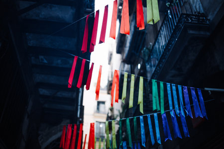 Party with Colorful ribbons in city outdoors. Preparations for the holiday and decorating the garden with colored ribbons. High quality photoの写真素材