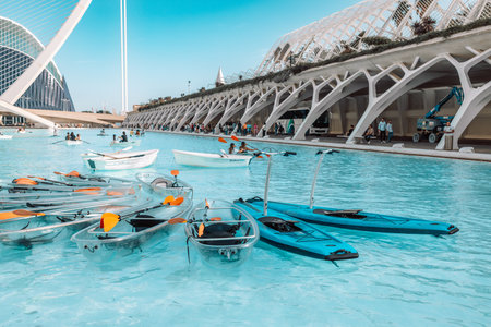 VALENCIA, SPAIN - October 15, 2022: Modern transparent boats on the water. The city of the Arts and Sciences in Valencia, Spain. High quality photoのeditorial素材