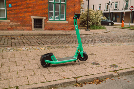 Electric scooter for rent on main square in Krakow, Poland. High quality photoの写真素材