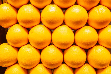 fresh orange fruits as background, top view. High quality photo