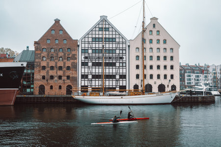 Gdansk, Poland - May 2022: Panorama of the city of Gdansk with water canal, boats and historical buildings on a beautiful sunny day of summer. Baltic states. Historical harbour city. High quality photoのeditorial素材