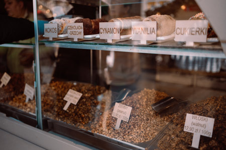 Trdelnik, traditional czech and european sweet street food, process of baking and cooking on street food festival market kiosk. High quality photoの写真素材