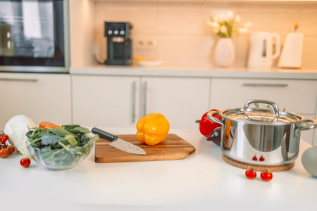 Different fresh vegetables on white table in modern kitchen. Space for text: High quality photoの写真素材
