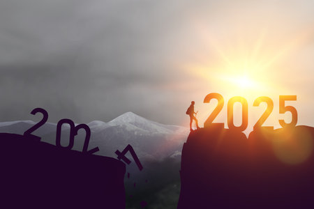 New year 2025 or straight forward concept. Text 2024 to 2025 written on the mountain top with at sunrise. Concept of planning, goal, challenge, new year resolution and start. High quality photoの写真素材