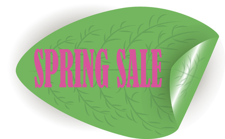 Spring sale. Pink letters on a green leaf.の写真素材