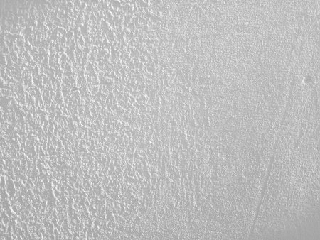 Stucco relief grey wall image. Relief texture