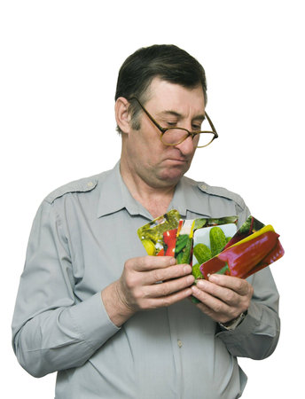 the Image of the man paper packages in which seeds of vegetable cultures are packed