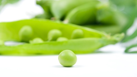 Fresh green peas in a podの写真素材