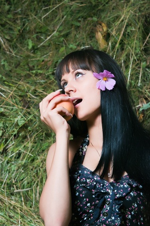 The young woman relaxing on hayloftの写真素材