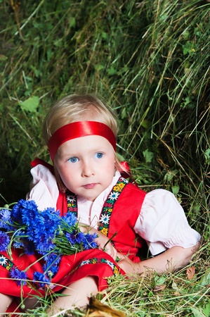 The image of the beautiful girl on a mowの写真素材