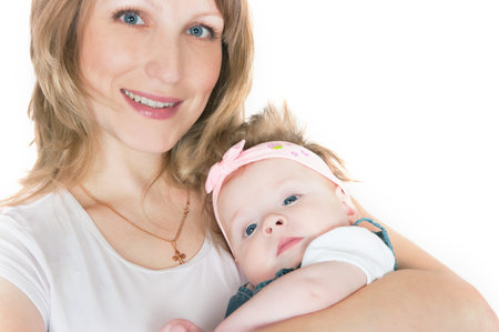 The image of the happy woman the kid on hands