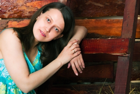 The image of the girl sitting on hayの写真素材