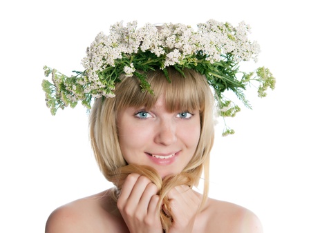  The girl with yarrow wreath on the headの写真素材