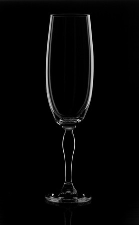 empty champagne glass on black backgroundの写真素材