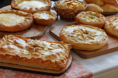delicious home-made cake on the table covered with tableclothの写真素材