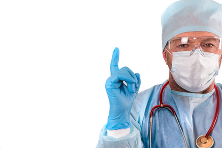 a doctor in a medical gown, hat, glasses and gloves warns #stayathome during the coronavirus...