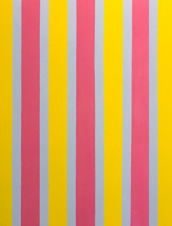 Bright rough wall painted in stripes. Striped seamless pattern with vertical stripes of pink, gray and yellow.の写真素材