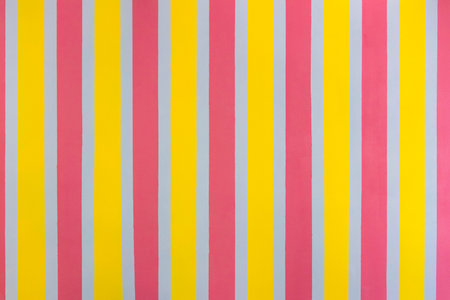 Bright rough wall painted in stripes. Striped seamless pattern with vertical stripes of pink, gray...