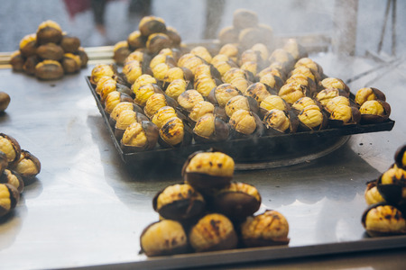 Fresh roasted chestnuts on truck for sale. National street dish, Istanbul.の写真素材