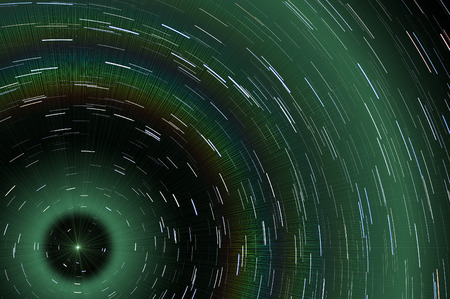 Abstract pattern with star tracks long exposure shot. Can be used as backgroundの写真素材