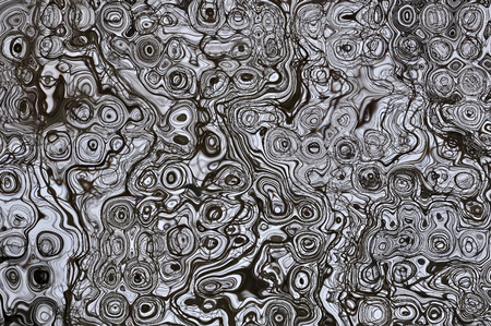 Abstract decorative background with blurred pattern of circles, figures, curves, lines and spots. Can be used as wallpaper.の写真素材