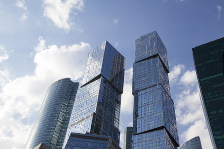 Low angle view of Moscow-City skyscrapers. Moscow-City (Moscow International Business Center) is a modern commercial buildings with a futuristic design in downtown.の写真素材
