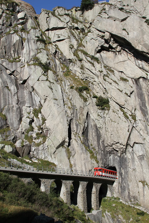 Modern bridge and a tunnel at St.Gotthard, Switzerlandの写真素材