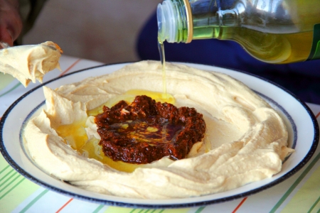 preparation of hummus  on dishの写真素材