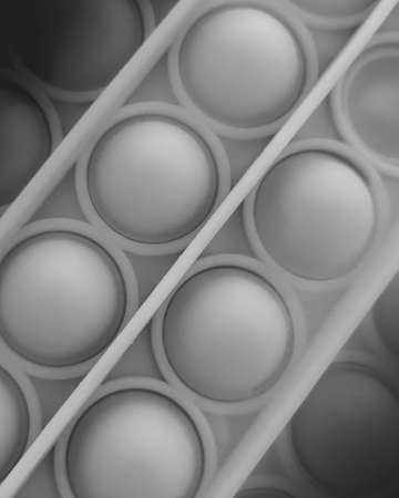 abstract gray background with raised circlesの写真素材