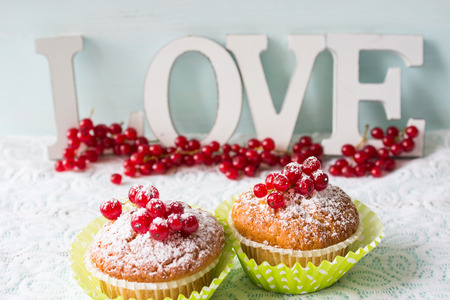 A word of love and a mini dessert on a light background.の写真素材