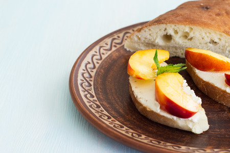 Sandwiches with cream cheese and fruit. Breakfast. Homemade bread and sandwiches with cream cheese.の写真素材