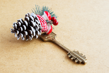 Key. Christmas gift concept. The key to the apartment and the Christmas decor.の写真素材