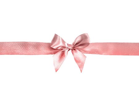 Pink bow isolated on white background. Silk ribbon,の写真素材