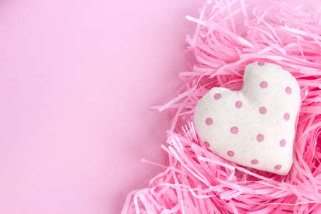 Pink Valentine's Day background. Happy holiday greetings concept. Place for text. Flat layout.の写真素材