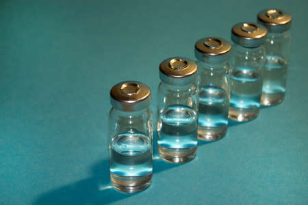 Vaccination against viruses. Vaccinations. Preparation and development of vaccines against viruses. Scientific research. Copy space.の写真素材