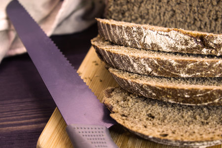 Bread. Sliced rye bread on a cutting board. Bread slices. Close-up. Copy space.