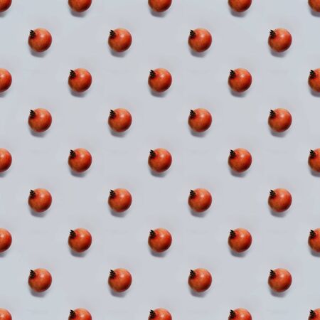 Photographic collage - pomegranate on gray background. Seamless pattern.の写真素材