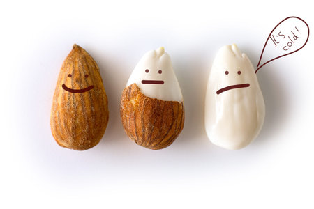 peeled young almonds on a white background, isolate, nut antioxidant
