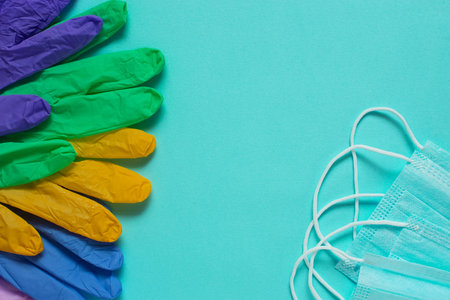 Prevent coronavirus. Medical mask, Medical protective mask isolated on blue background. Coronavirus hygiene conceptの写真素材