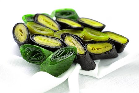 fruit pastille from apples and apricots and blackcurrants and blueberries, and gooseberries or kiwi, dried fruit and berry puree sheets. Organic food. Natural productsの写真素材
