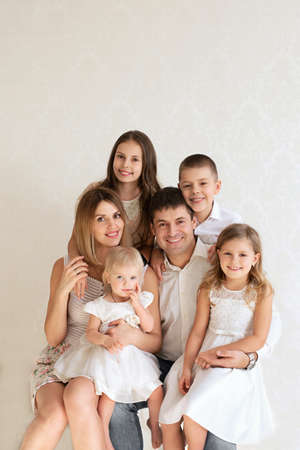 Moscow, Russia, February 15, 2020. A happy family with three children a top view. Beautiful large family having fun.のeditorial素材