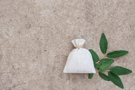linen bag on a concrete background. Place for text. Moch up