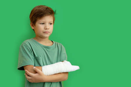 A child with a plaster on his hand. Copy space.の写真素材