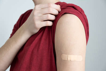 Young men vaccinated against infectionの写真素材